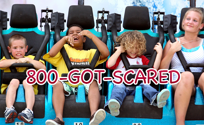 Young kids on roller coaster using 1-800-GOT-SCARED