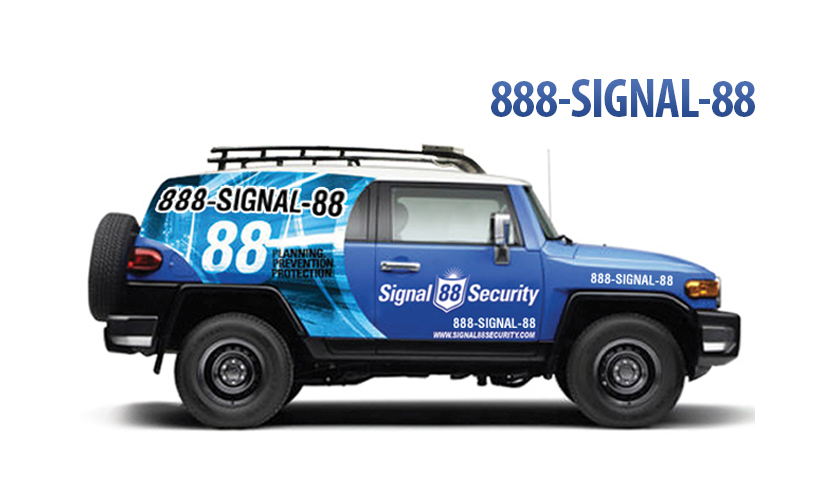 Signal88 Security truck displaying 1-888-SIGNAL-88
