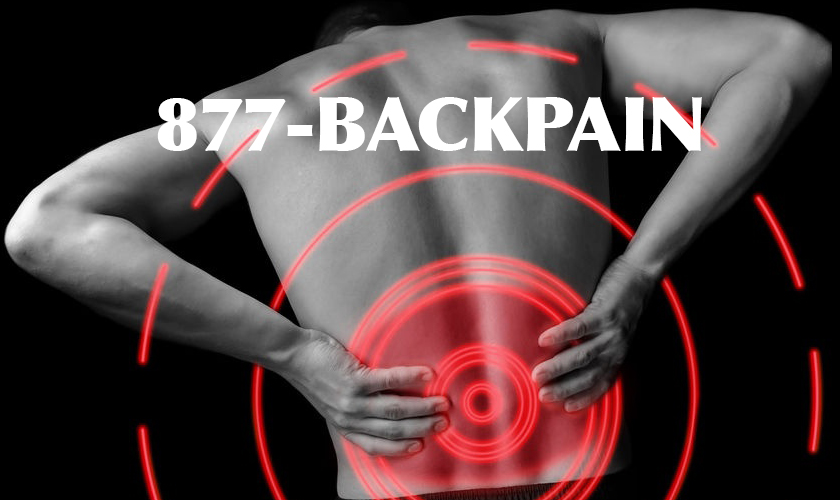 Backside of man holding his lower back displaying 1-877-BACKPAIN